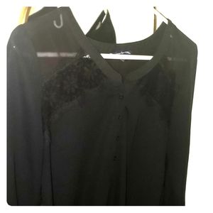 Slinky black button up blouse with laser cutouts